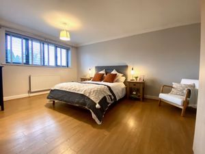 Bedroom One- click for photo gallery